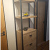 Kast hoog statue eiken met staal, stalen frame zwarte poedercoating en lades van Hout-Art.